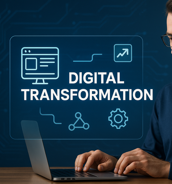 Man sitting behind a sign says Digital Transformations.